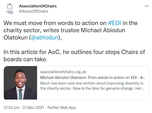 A screenshot of a tweet from  AssociationOfChairs @AssocOfChairs, dated Dec 21, 2021. The tweet reads "We must move from words to action on #EDI in the charity sector, writes trustee Michael Abiodun Olatokun ( @ab1odun). In this article for AoC, he outlines four steps Chairs of boards can take." Underneath is a preview of Abiodun's article titled "Michael Abiodun Olatokun: From words to action on EDI - Association of Chairs".